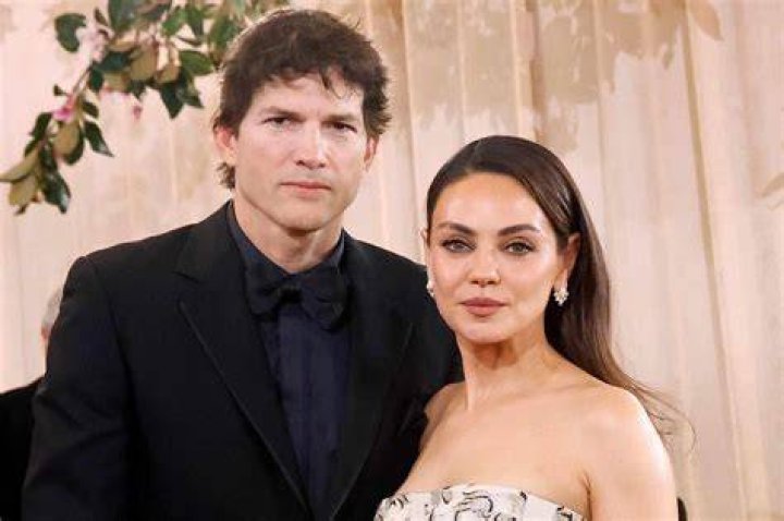 Ashton Kutcher and his wife Mila Kunis with their son Dimitri Portwood Kutcher.